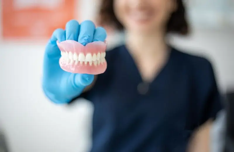 Natural-looking custom dentures made at Recreate Smiles Joondalup